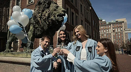  Scholars Lions posing with friends and fellow graduates