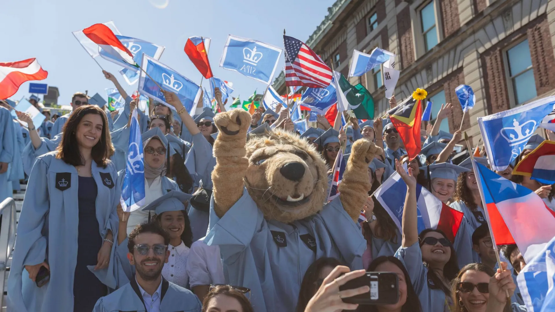 School of International and Public Affairs graduates at Commencement by Lucas Hoeffel.