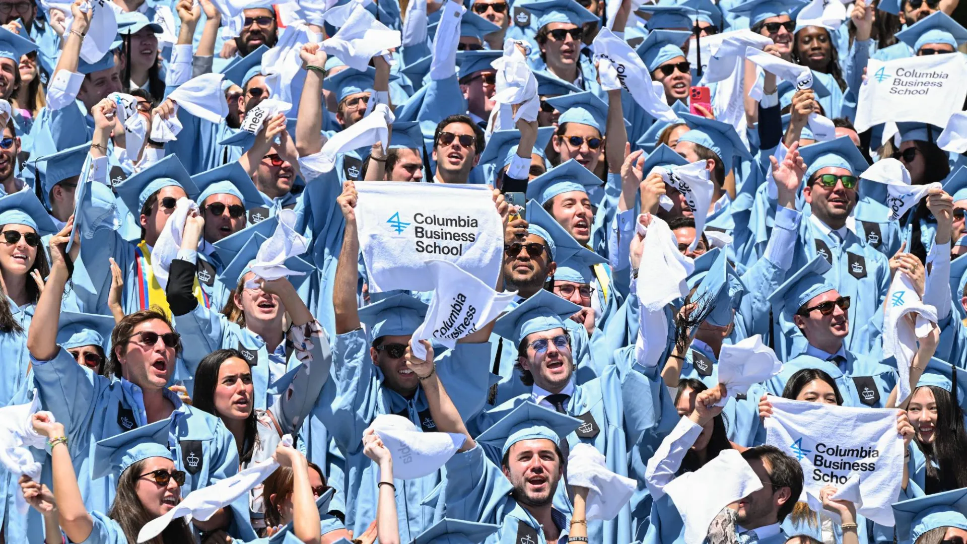 Cheering Business School graduates by Diane Bondareff