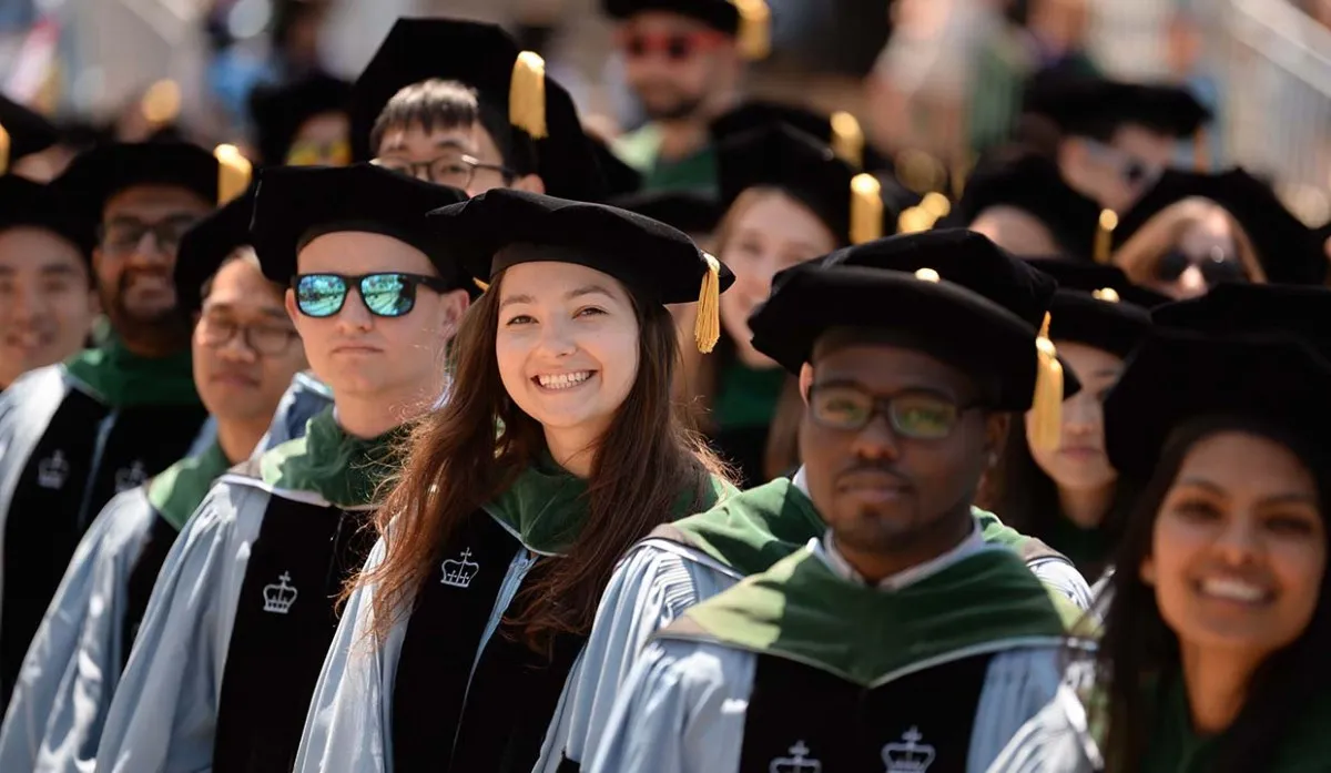 Columbia Vagelos College graduates smiling for the camera