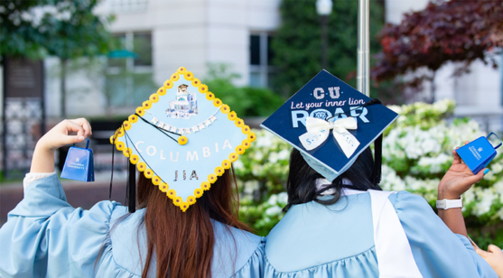 Graduating students with their personalized caps during University Commencement