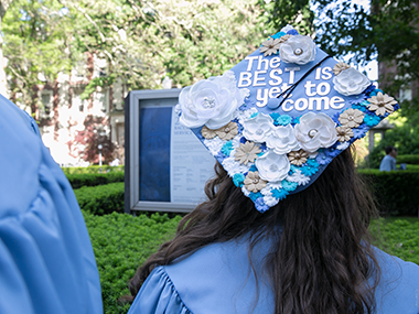 Grad mortarboard decorated with the text "The best is yet to come"